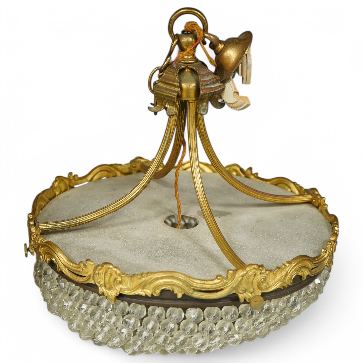 An ormolu and glass drop bag chandelier. Condition - some drops missing/loose